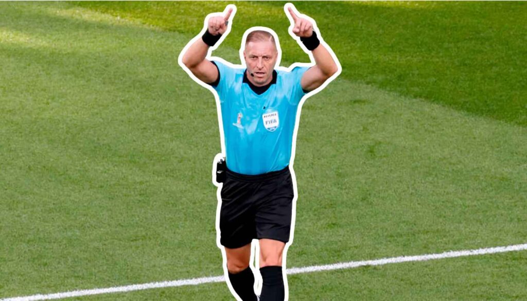 Referee going to the VAR monitor.