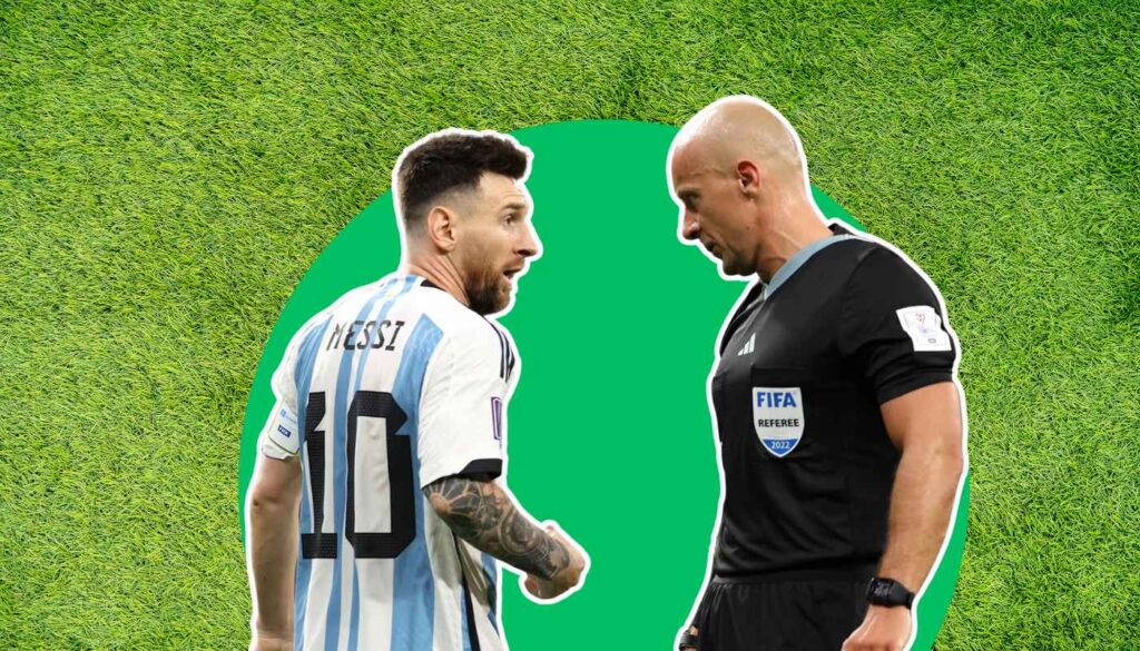 Messi speaking to a referee